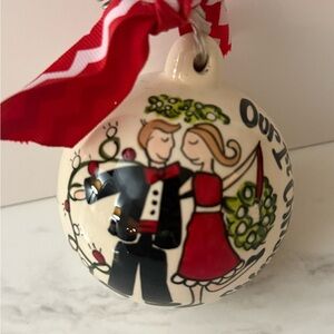 Holiday Ornament with Red and Black Design